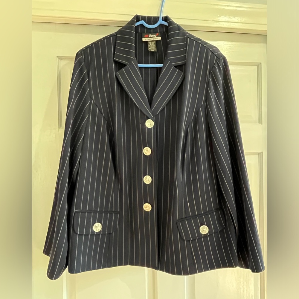 Navy and white pinstriped suit